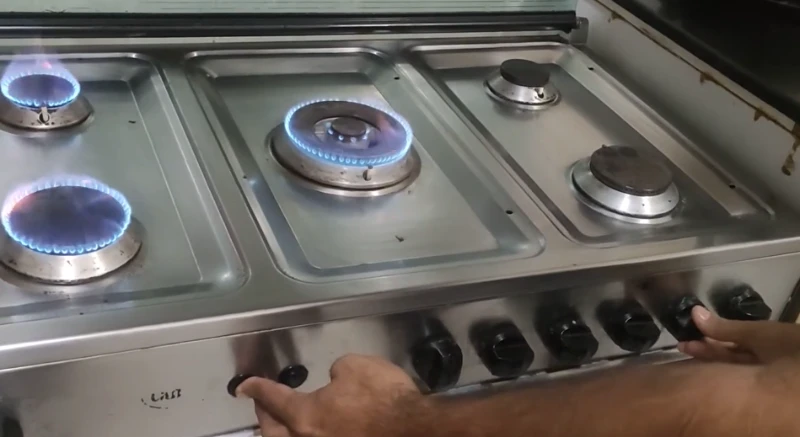 Technician repairing an oven, range, and stove during an appliance repair service call in Abilene, TX